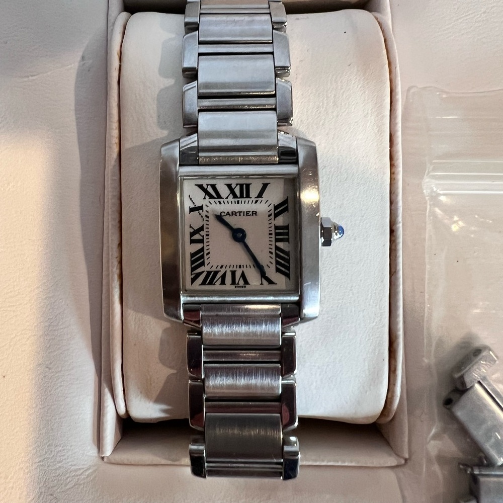 Authentic Pre-owned small ladies Cartier Tank Francaise stainlesss steel watch.